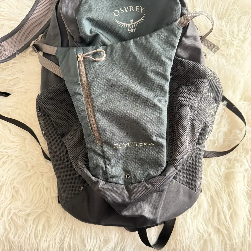 Osprey Daylite Plus Backpack in Black featuring a front stash pocket - Picture 3 of 14